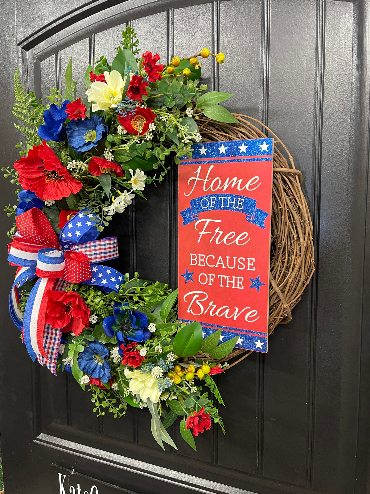 Patriotic Floral Grapevine Wreath with Removable “Home of the Free Because of the Brave” Sign – Red, White & Blue Summer Door Decor – Memorial Day, 4th of July, Veteran Gift, KatsCreationsNMore