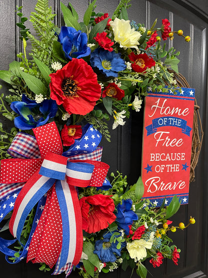 Patriotic Floral Grapevine Wreath with Removable “Home of the Free Because of the Brave” Sign – Red, White & Blue Summer Door Decor – Memorial Day, 4th of July, Veteran Gift, KatsCreationsNMore