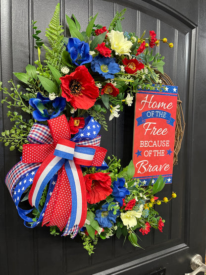 Patriotic Floral Grapevine Wreath with Removable “Home of the Free Because of the Brave” Sign – Red, White & Blue Summer Door Decor – Memorial Day, 4th of July, Veteran Gift, KatsCreationsNMore
