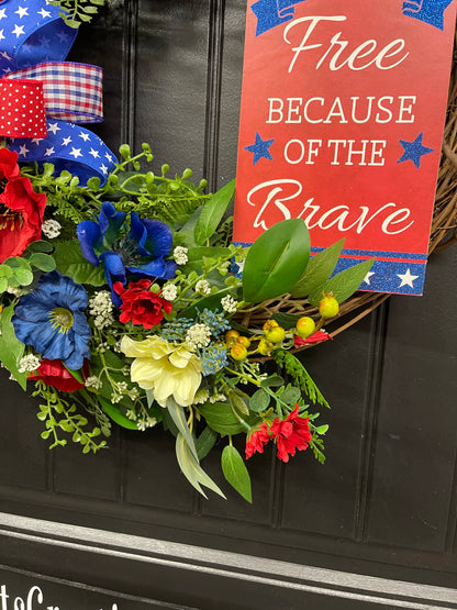 Patriotic Floral Grapevine Wreath with Removable “Home of the Free Because of the Brave” Sign – Red, White & Blue Summer Door Decor – Memorial Day, 4th of July, Veteran Gift, KatsCreationsNMore