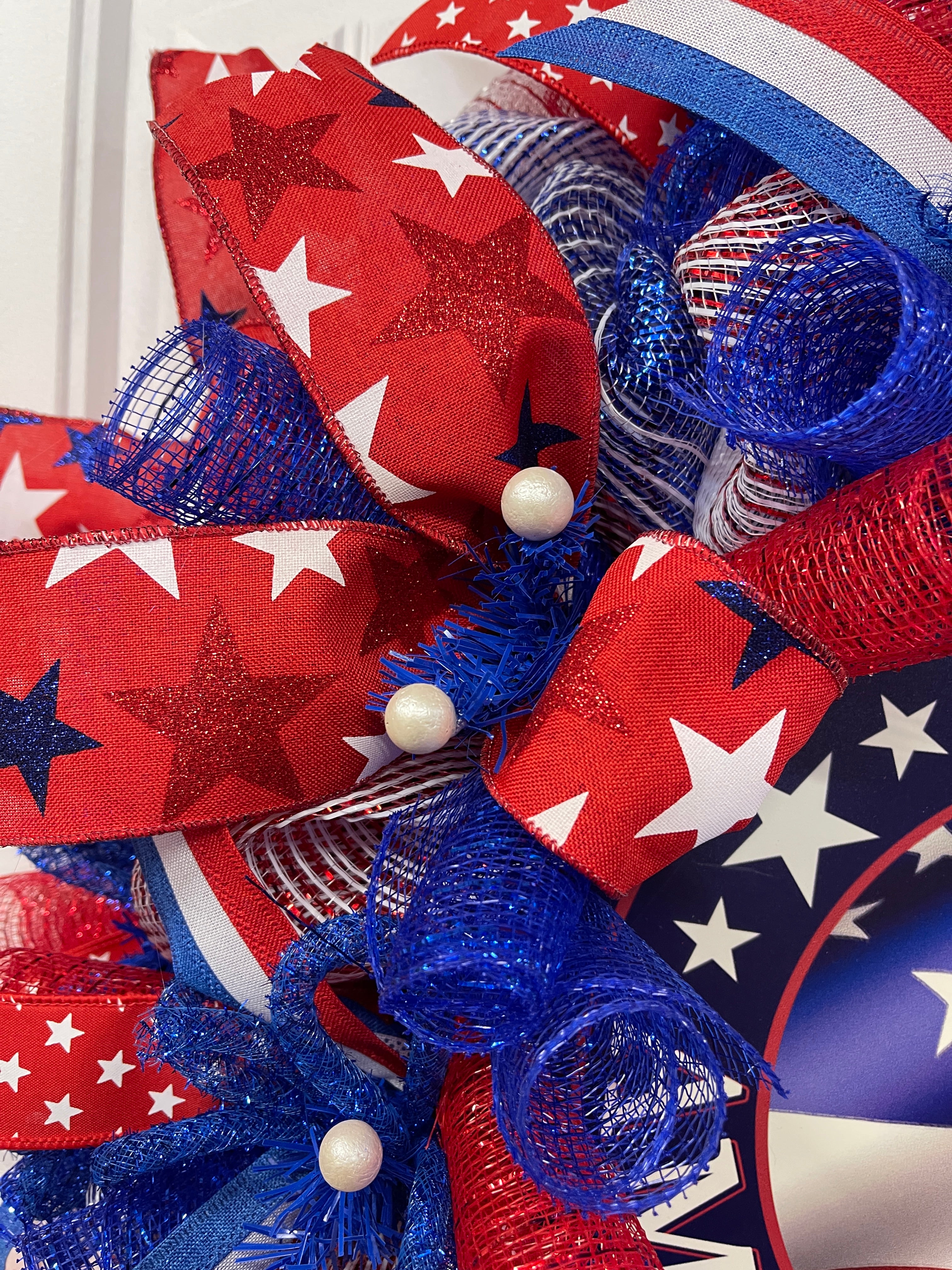 Close Up Detail with White Balls on Ribbon with Red, White and Blue Stars