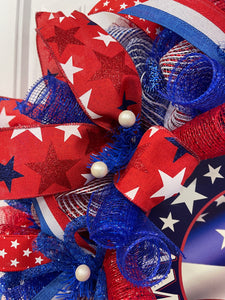 Close Up Detail with White Balls on Ribbon with Red, White and Blue Stars