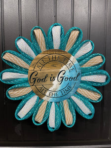 Teal, White and Beige Deco Mesh Daisy Chain Petal Wreath with a Sign that reads, "All the Time God is Good" on a black door.