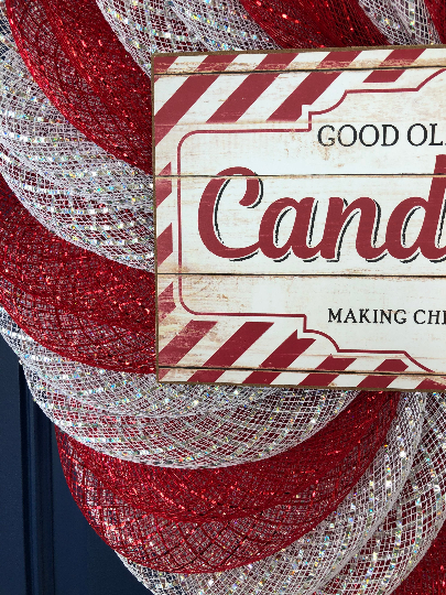 closeup of the red and white candy cane peppermint  Christmas wreath
