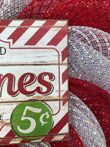 closeup of the candy cane Christmas wreath sign