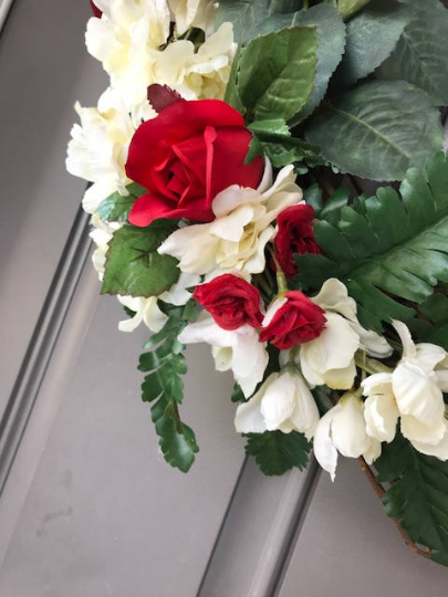 Close Up Details of Red Roses and White Delphinium Florals 