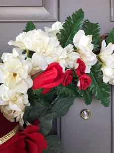 Close Up Details of White Delphinium and Red Roses