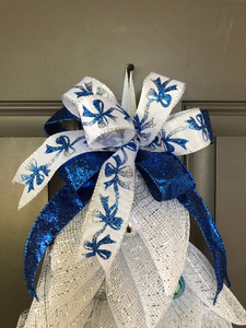 Close Up Detail with White and Blue Bow Ribbon and a Solid Blue Glitter Ribbon