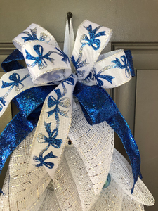 Close Up Detail with White and Blue Bow Ribbon and a Solid Blue Glitter Ribbon
