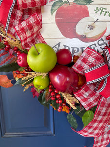 Close Up on Red and Green Apples small and large on a Fall Grapevine Apple Wreath