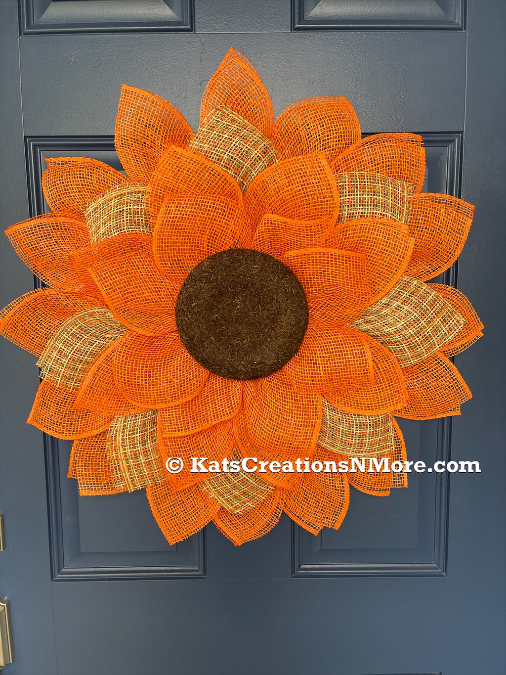 Poly Burlap Mesh Sunflower Wreath Featuring Orange and Patterned Colors of Yellow, Brown and Orange with a Brown Center on a Blue Door