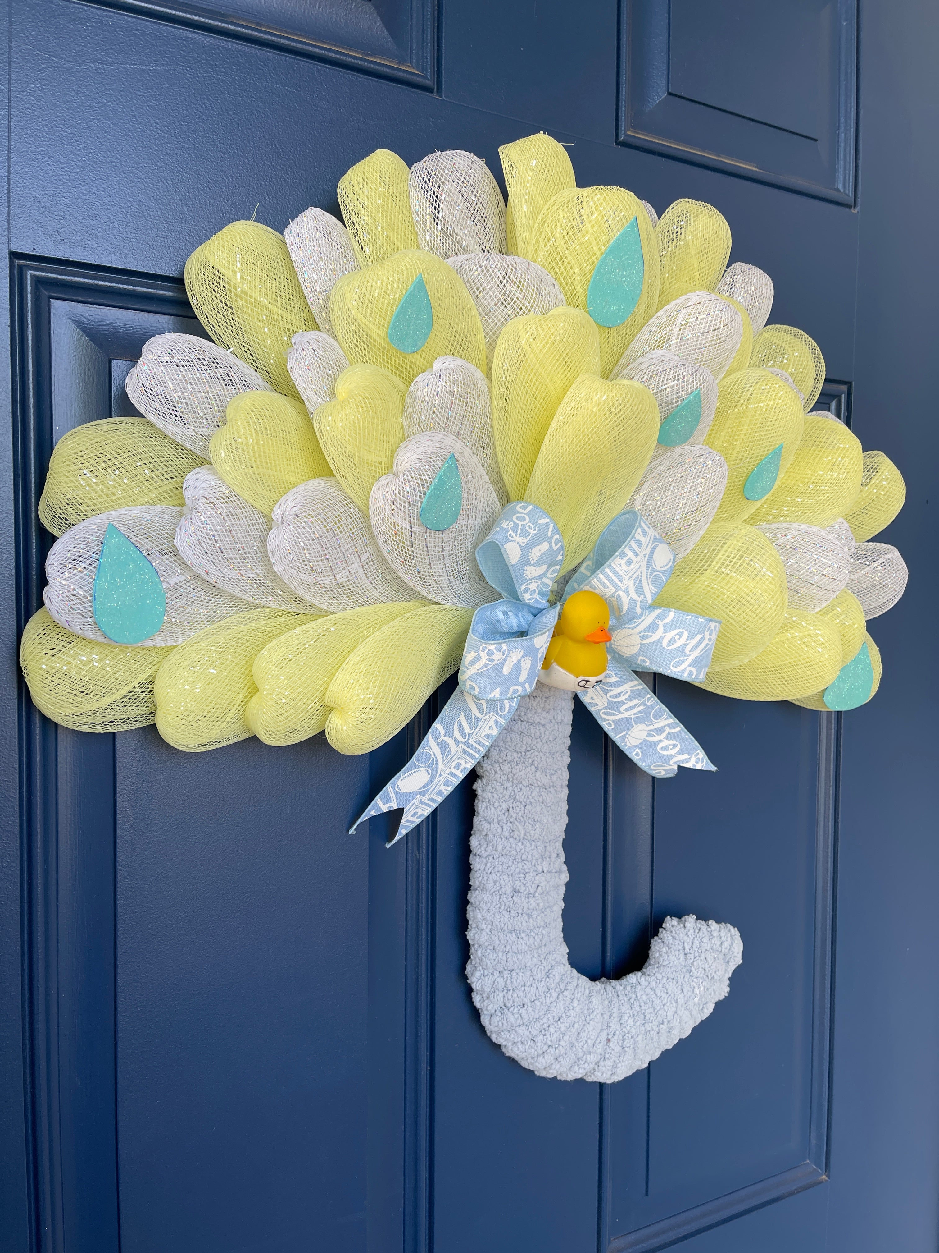 Side View of Blue, White and Yellow Deco Mesh Umbrella Wreath for Baby Boy Shower