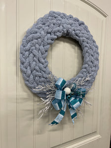 Left Side View of Blue Gray Chenille Yarn Braided Winter Wreath on a White Door