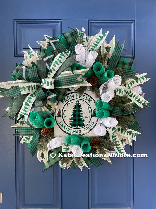 White, Green and Black Deco Mesh Farm Fresh Christmas Wreath on a blue door. 