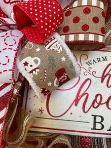 Detail of Hot Chocolate Ribbon with Fur Edge in White and cups of hot cocoa with marshmallows, and peppermint sticks on a natural tan ribbon