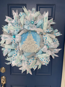 Blue and White Deco Mesh Winter Christmas Tree Wreath on a Blue Door 
