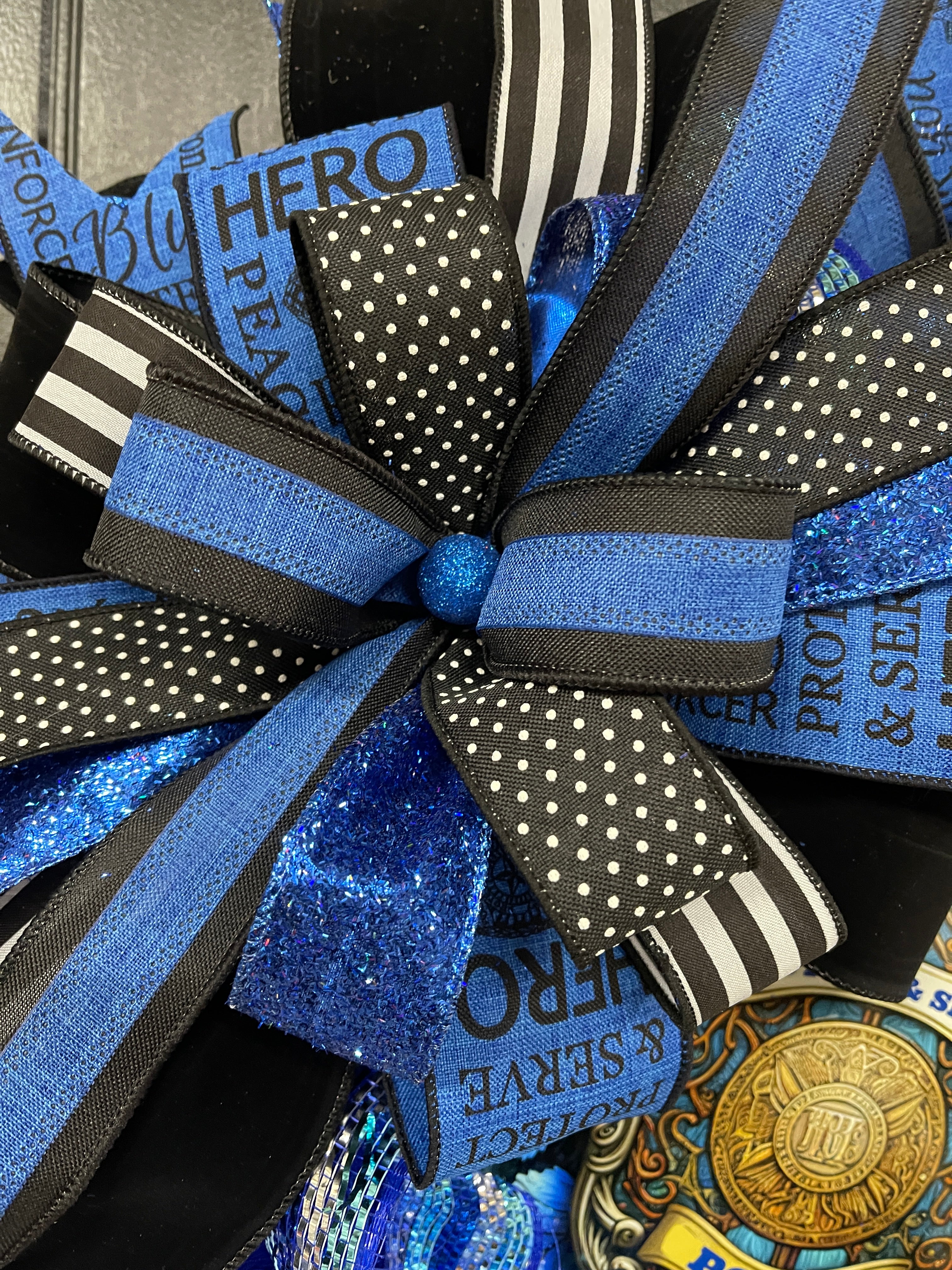 Close Up of Bow on Protect and Serve Police Support Wreath Black and Blue on Black Front Door