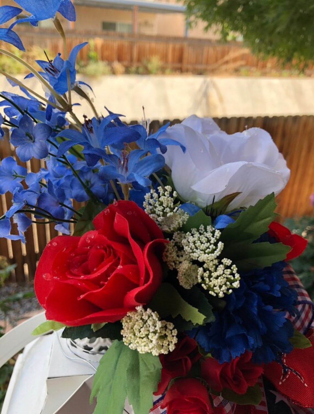 Red, White and Blue Roses and Cornflower Floral Patriotic Lantern Swag on a White Lantern with Red, White and Blue Bow