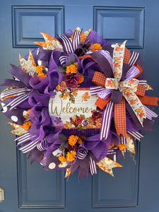 Purple and Orange Deco Mesh and Fall Floral Welcome Wreath on a Blue Door