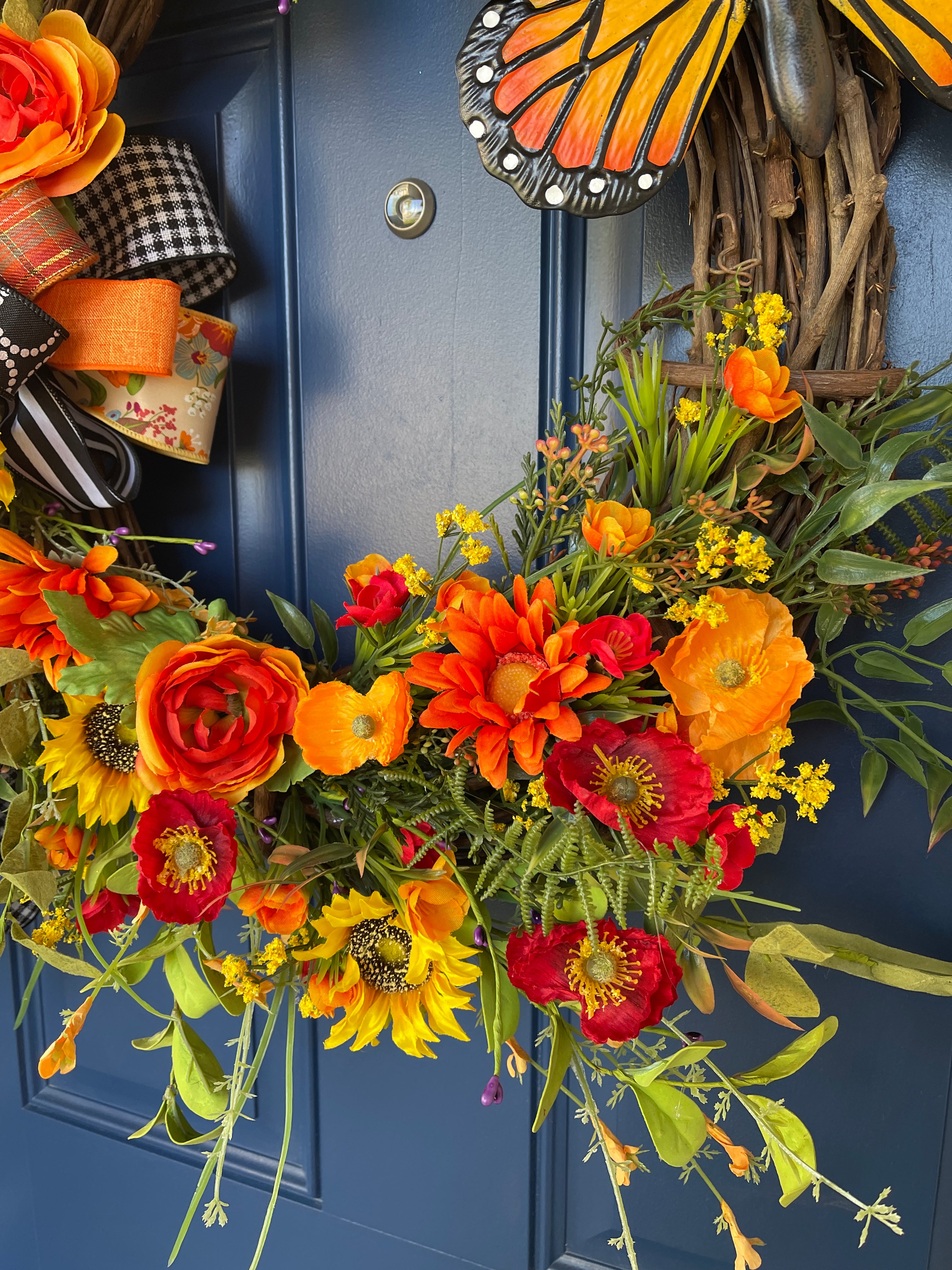 Orange, Yellow and Red Poppies, Sunflowers, Ranunculus and Meadow Flowers on a Grapevine Wreath