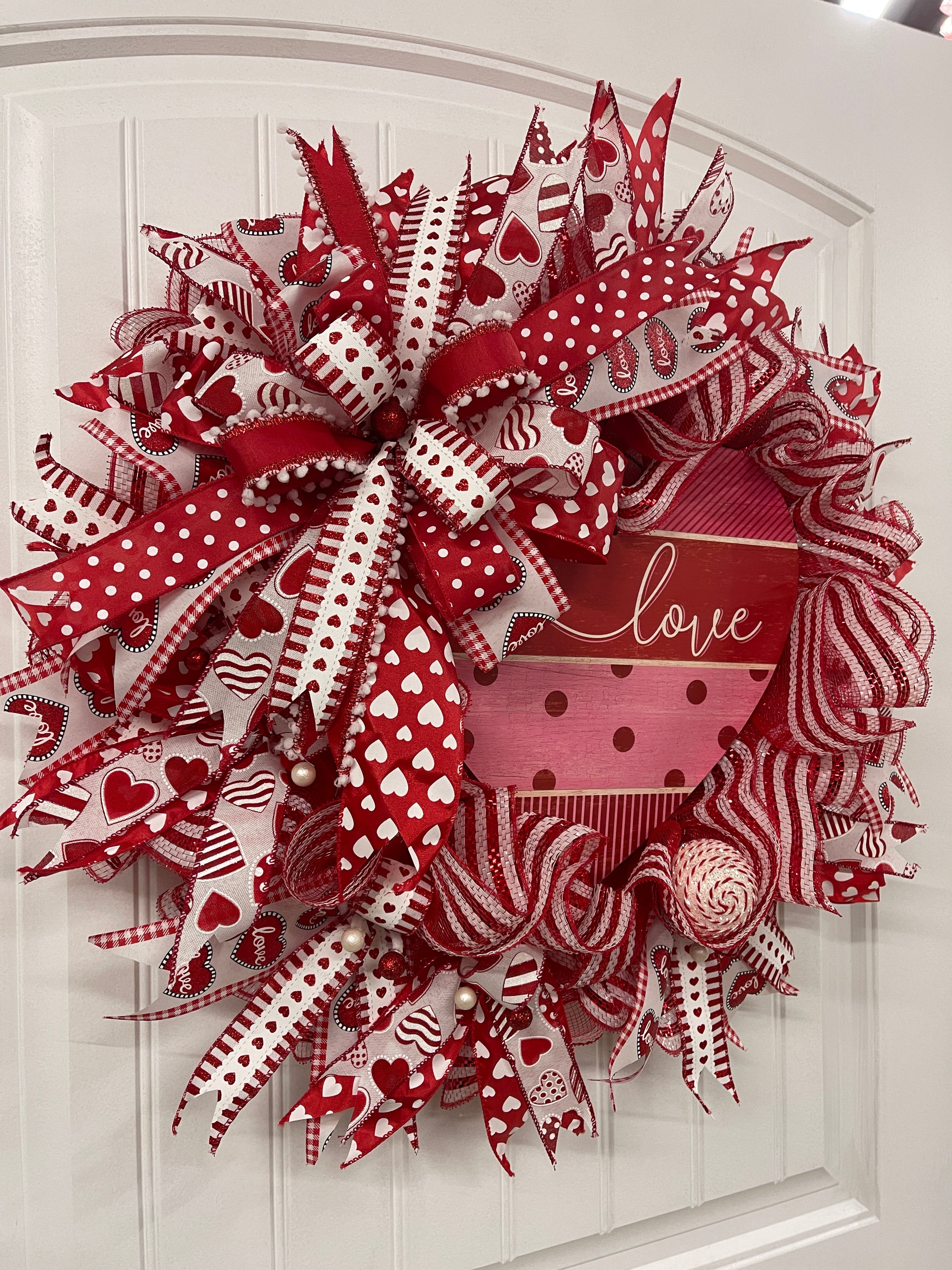 Left Side View of Red and White Deco Mesh Heart Love Valentine's Day Wreath on a White Door