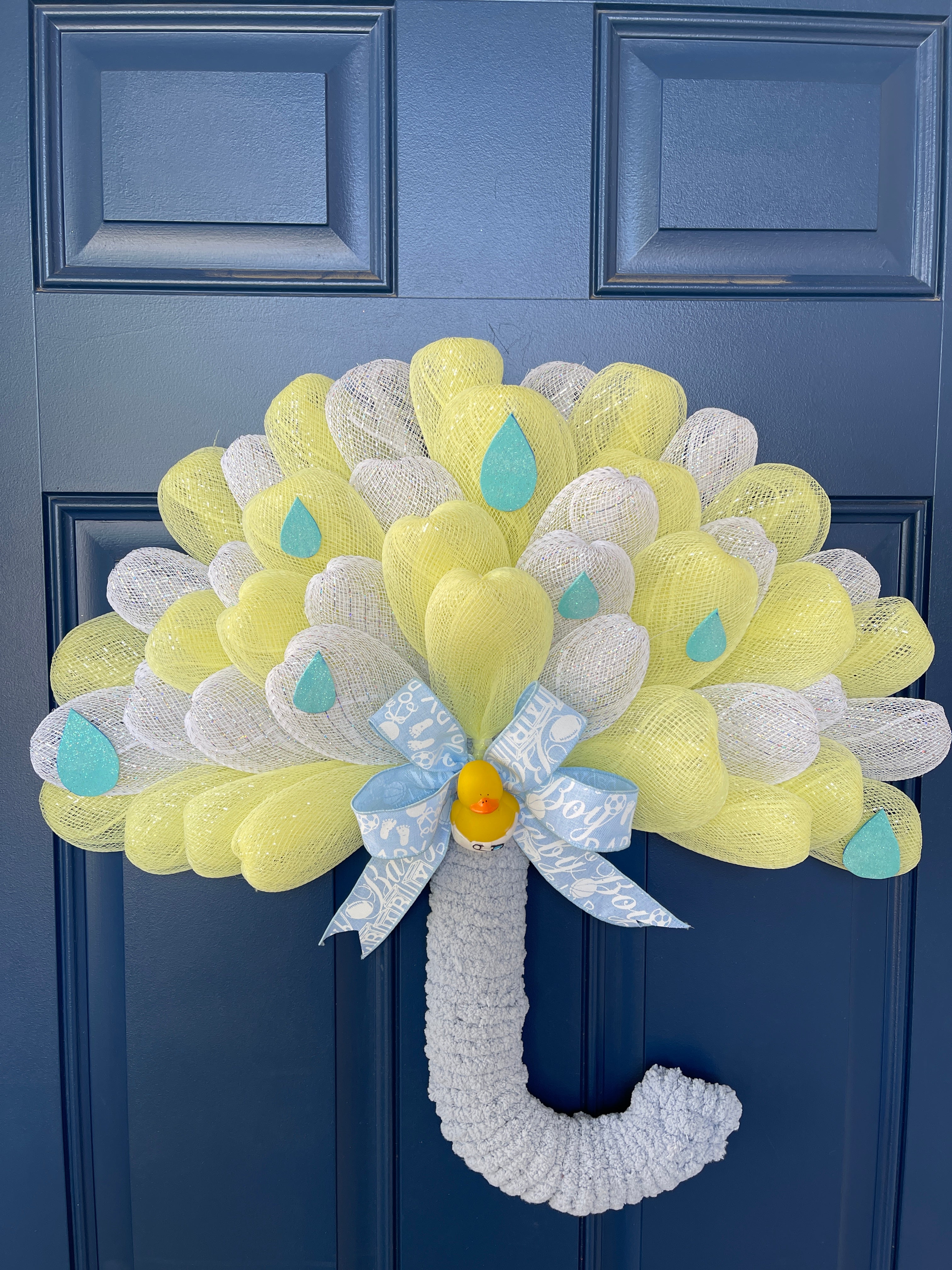 Top View of Blue, White and Yellow Deco Mesh Umbrella Wreath for Baby Boy Shower