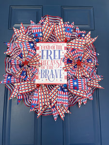 Bottom View of Red, White and Blue Stars and Stripes Storm Door Land of the Free Because of the Brave Wreath on a Blue Door