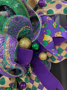 Close Up Details of Glitter Balls in Purple, Green and Gold
