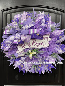 Purple and White Deco Mesh Religious Easter He Is Risen Floral Wreath on Black Door