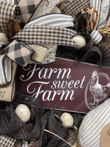 Close Up of Brown and White Farm Sweet Farm Sign on a Chicken Wreath 