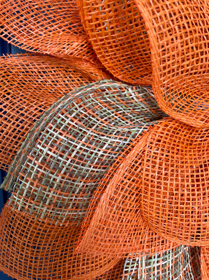 Close up of the Petals of Poly Burlap, Orange and then Orange, Brown, Green and Tan Patterned Mesh