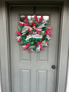 Red, White and Green Merry Christmas Deco Mesh Wreath on a Green Door
