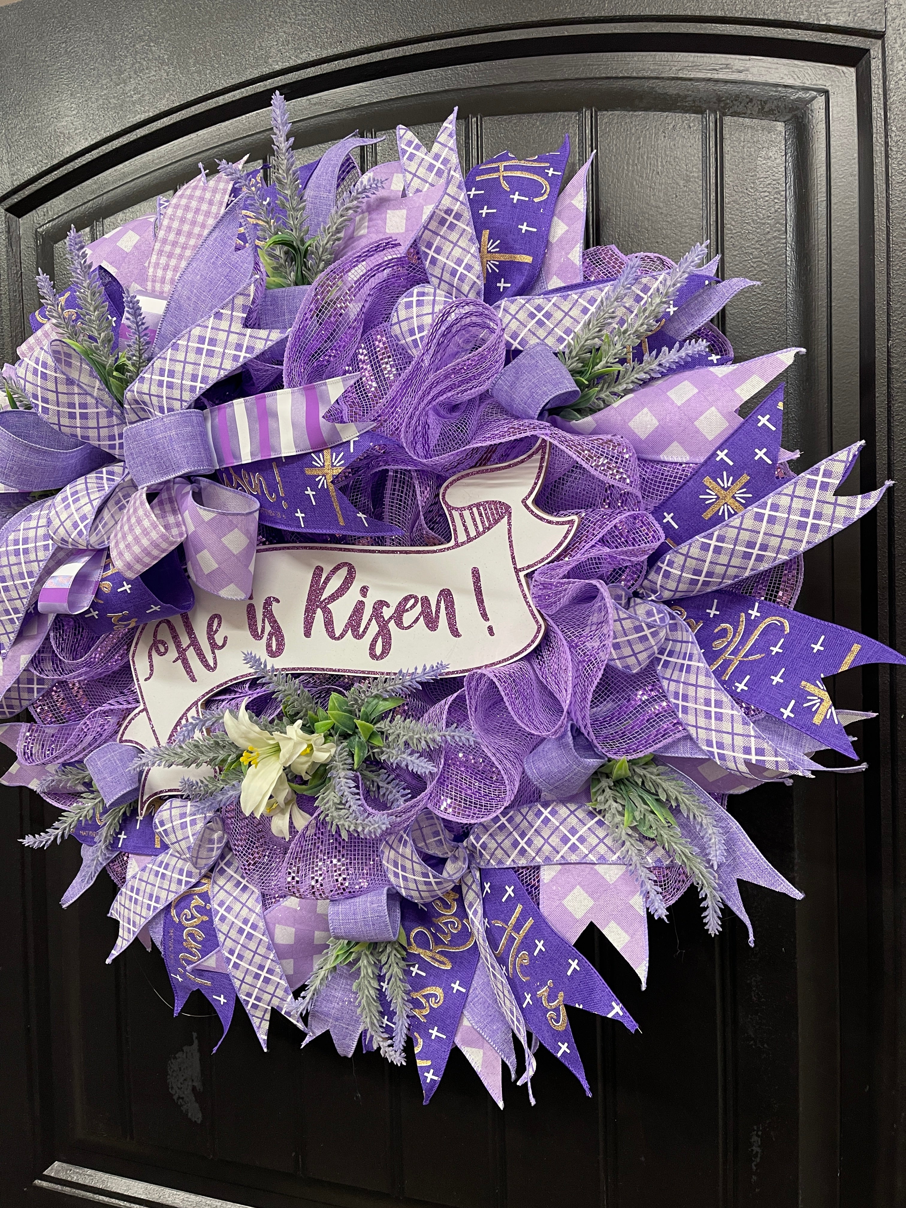 Right Side View of Purple and White Deco Mesh Religious Easter He Is Risen Floral Wreath on Black Door