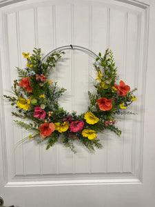 Orange, Pink and Yellow Cosmos Florals with Meadow Greens on a Silver Hoop Wreath on a White Door
