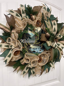 Left Side View of Pine and Pinecone, Green, Tan and Brown, Forest Mountain Cabin Welcome Wreath on a White Door