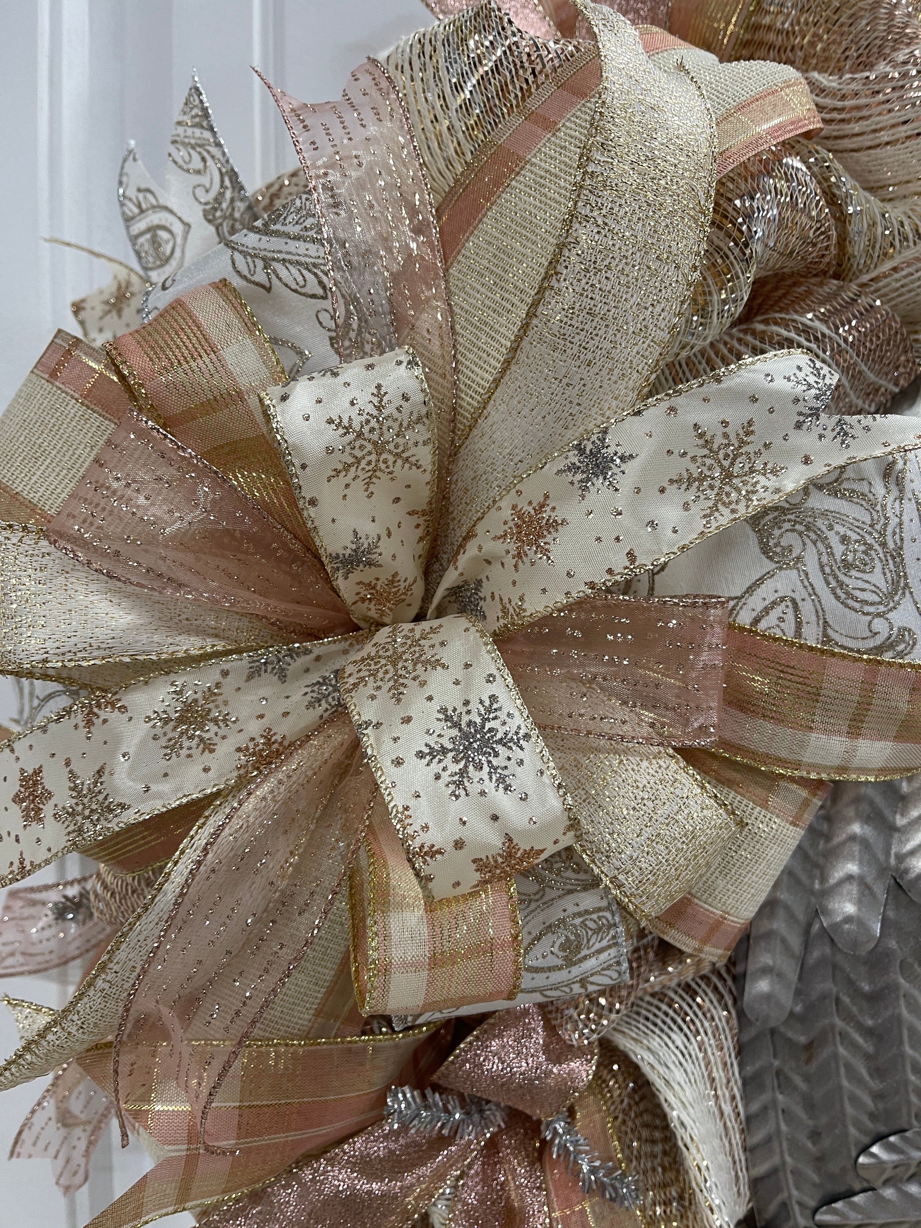 Close Up of Bow with Silver and Gold Snowflakes on White Ribbon, Rose Gold and Sequin Ribbons, Rose Gold and Plaid Ribbon, White Metallic Ribbon and Silver and Gold on White Ribbon
