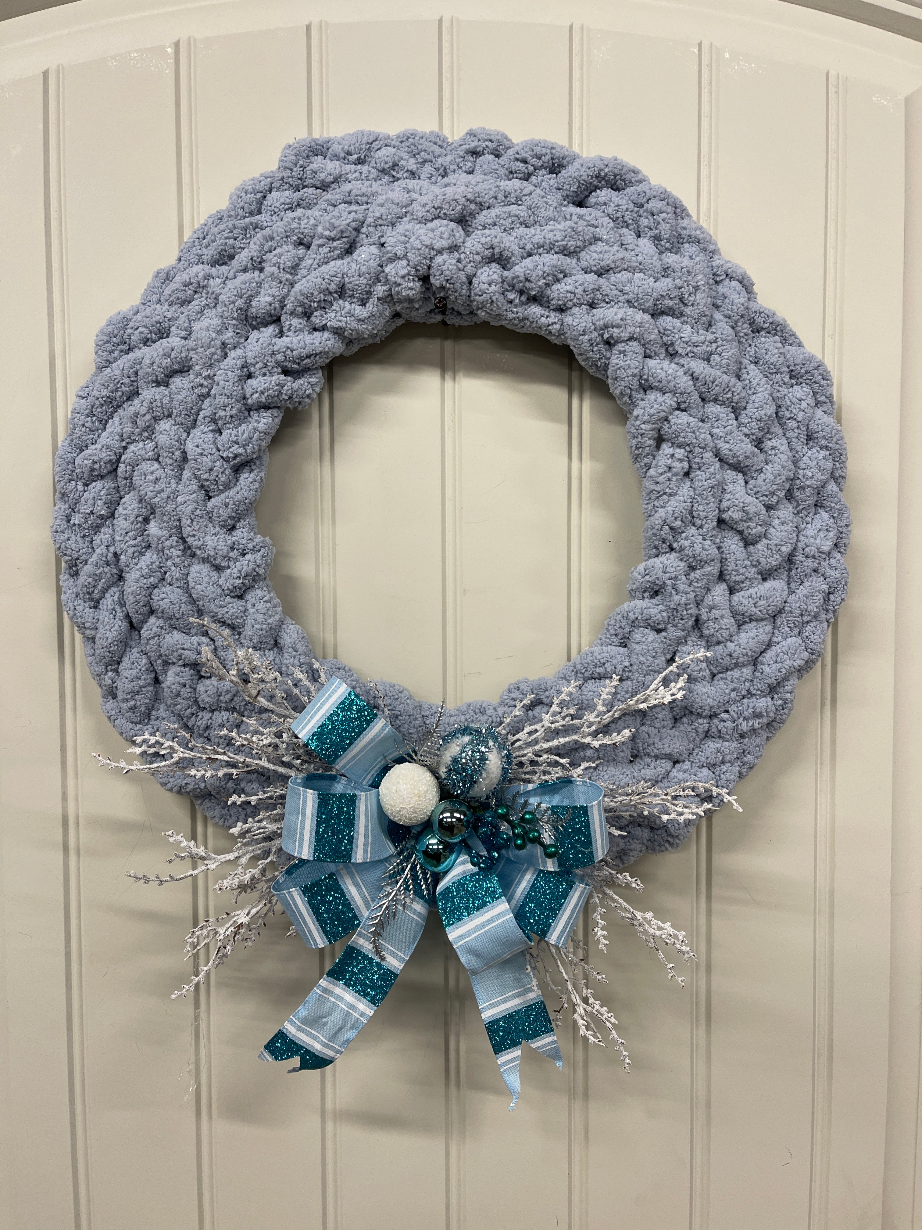 Blue Gray Chenille Yarn Braided Winter  Wreath on a White Door
