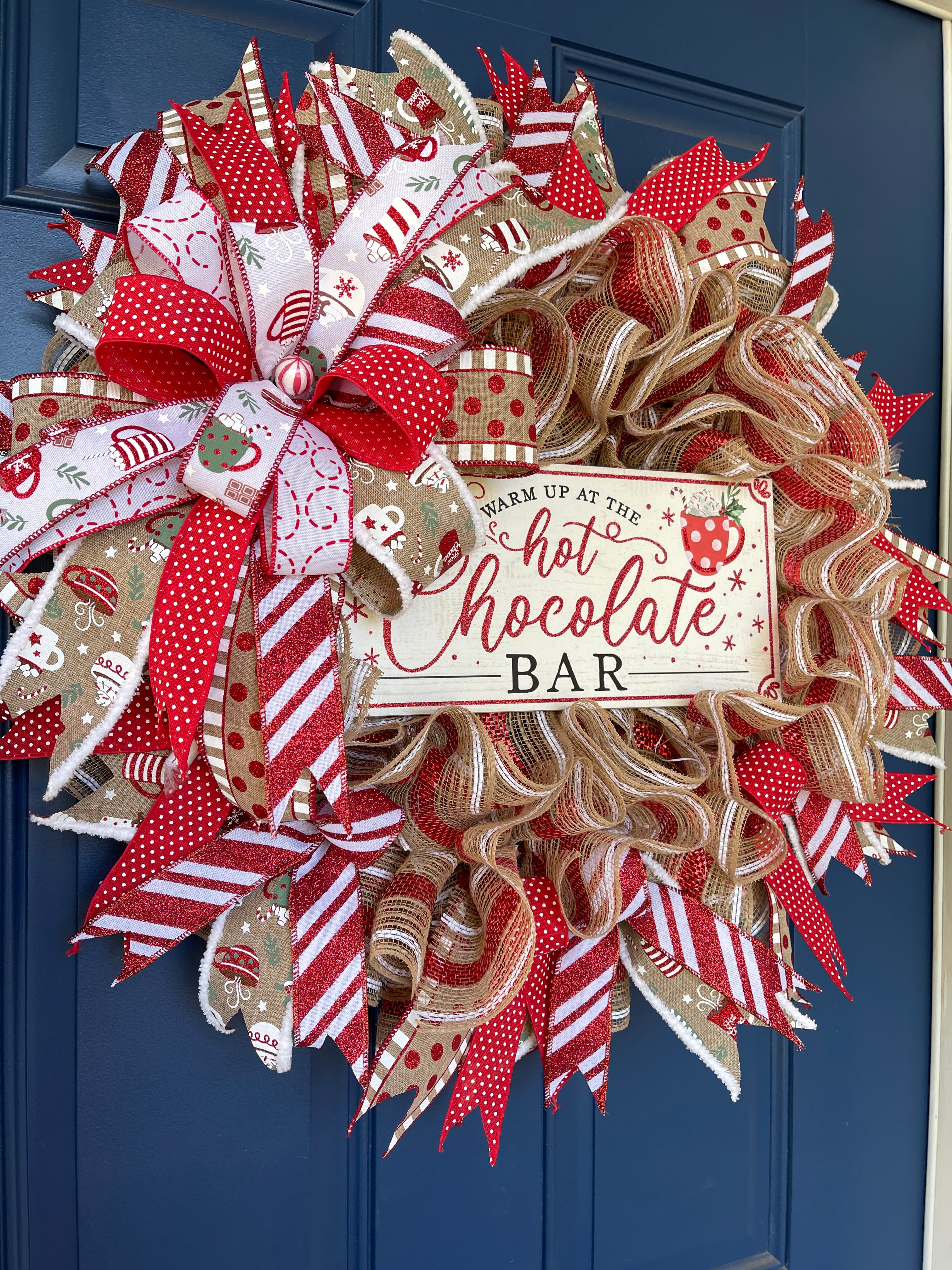 Left Side View of Hot Chocolate Bar Christmas Red, White and Tan, Deco Mesh Wreath on Blue Door