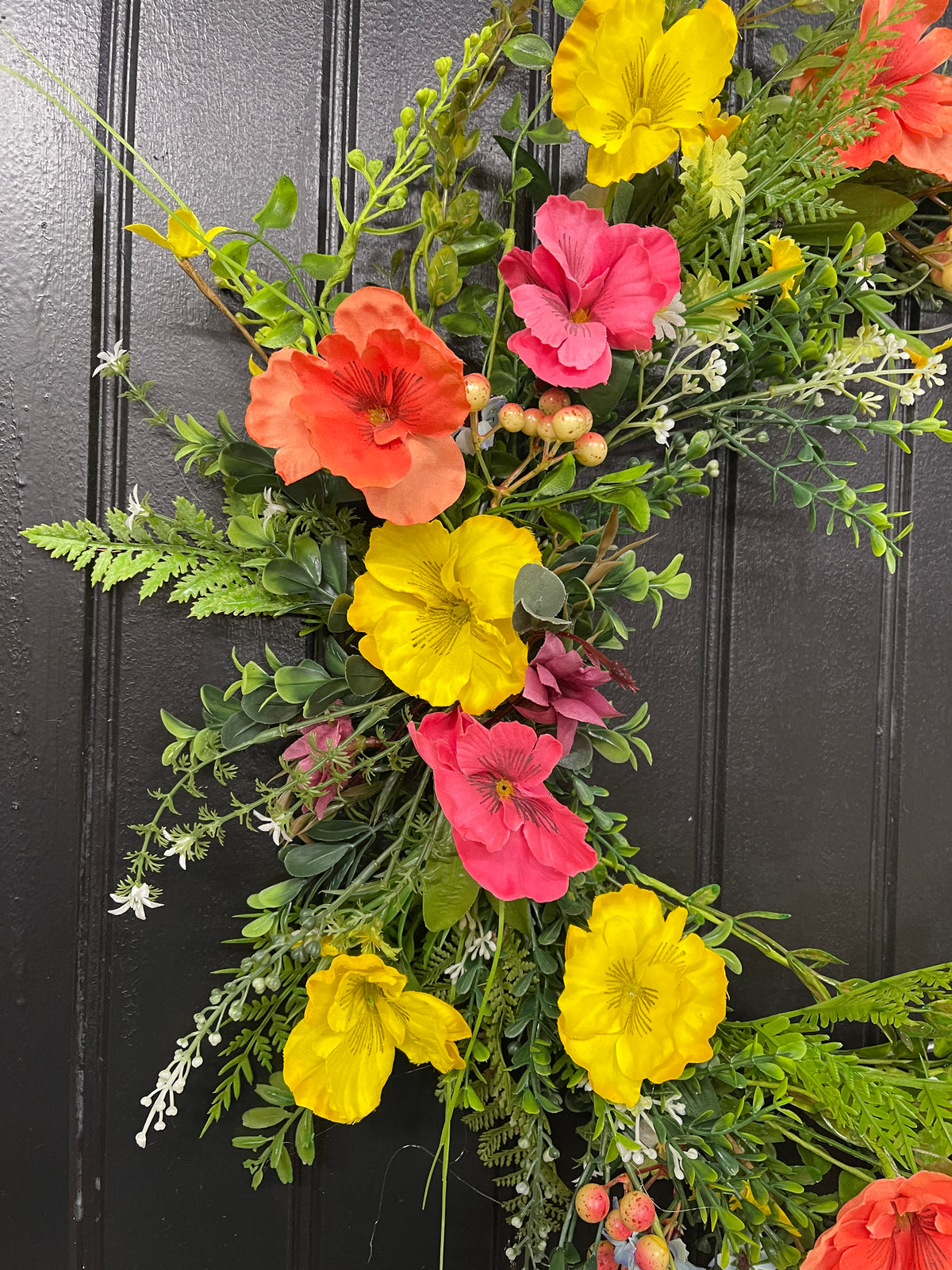 Orange, Pink and Yellow Cosmos Florals with Meadow Greens on a Silver Hoop Wreath on a Black Door
