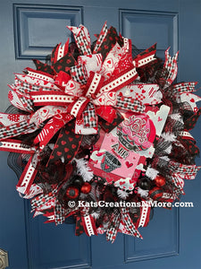Red, White and Black Heart Filled Wreath with a Love its in the Air Hot Air Balloon sign on a Blue Door