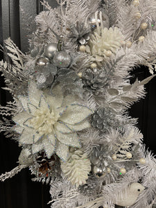 Close Up Detail of White Frosted and Glittered Poinsettias, Silver Pine Cones, White Pine Cones, Silver, Gray and White Christmas Balls